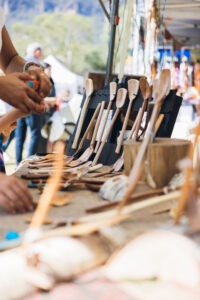 Stalls and visitors at Megalong Valley Rural Market with local crafts, produce and live music. Photo by Assemble Photography.