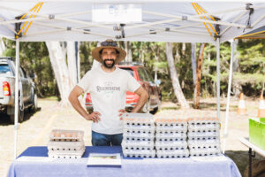 Stalls and visitors at Megalong Valley Rural Market with local crafts, produce and live music. Photo by Assemble Photography.