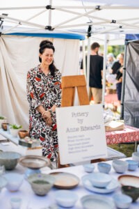Stalls and visitors at Megalong Valley Rural Market with local crafts, produce and live music. Photo by Assemble Photography.