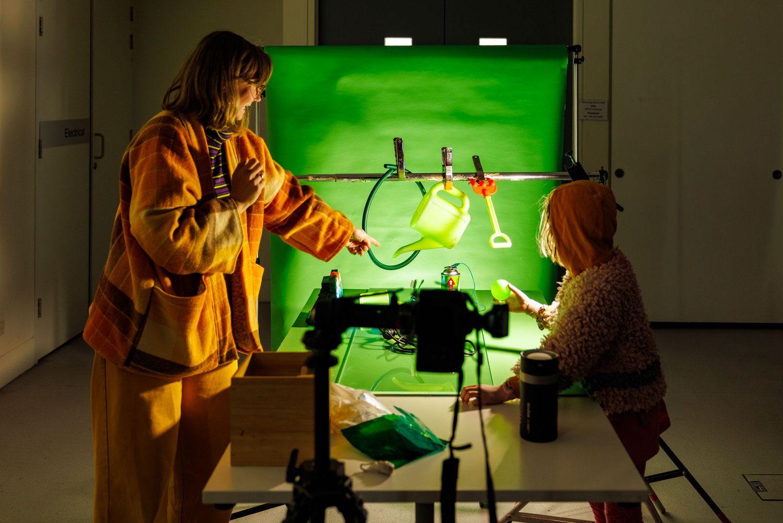 Adult and child using an interactive projection during the Blue Mountains Sustainability Festival
