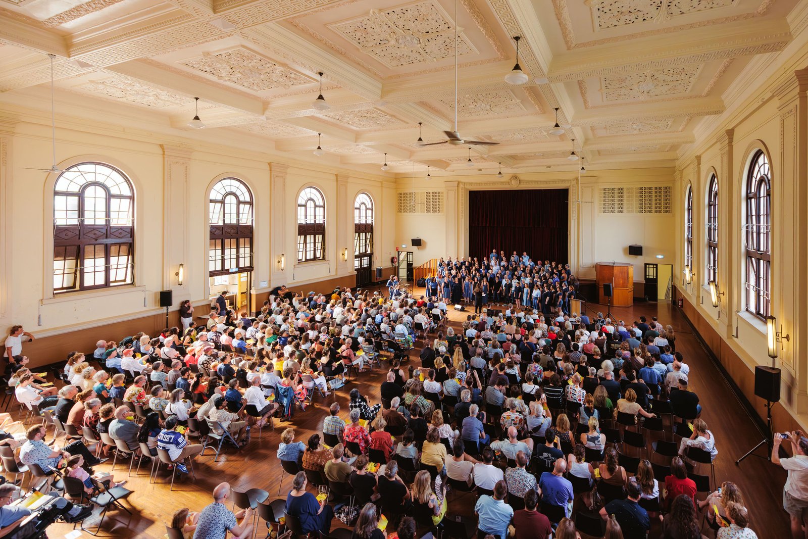 Audience filling Marrickville Town Hall for the Inner West Voices Summer Concert