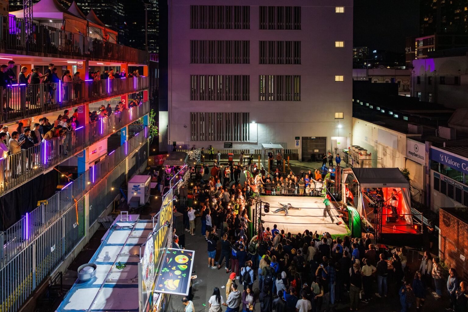 Large crowd gathered across a multi-level venue during Parramatta Lanes